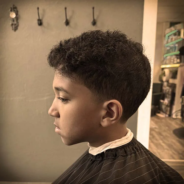 Low-fade haircut with clean line-up by Black Hat Barber, Willoughby OH