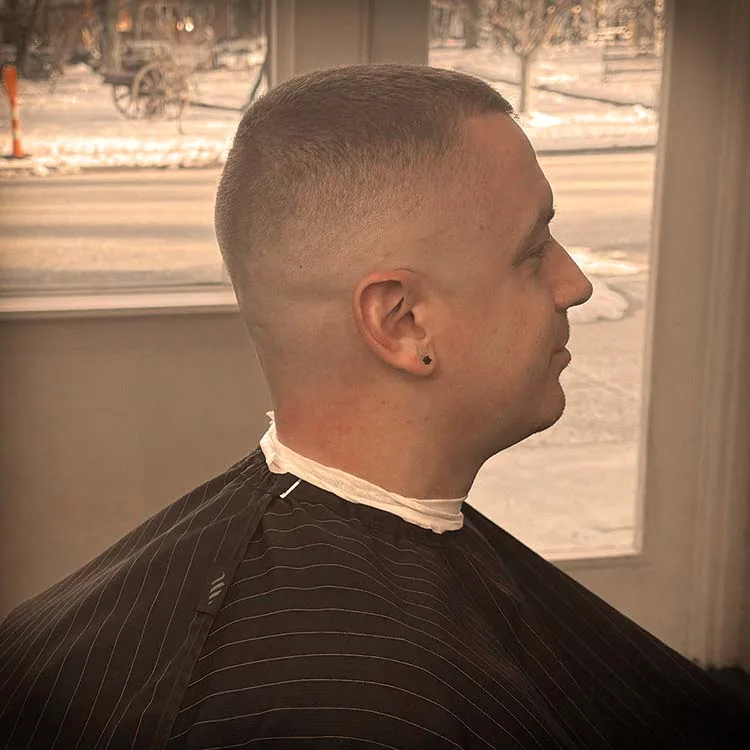 Black Hat Barber station, noir barbershop aesthetic, downtown Willoughby OH