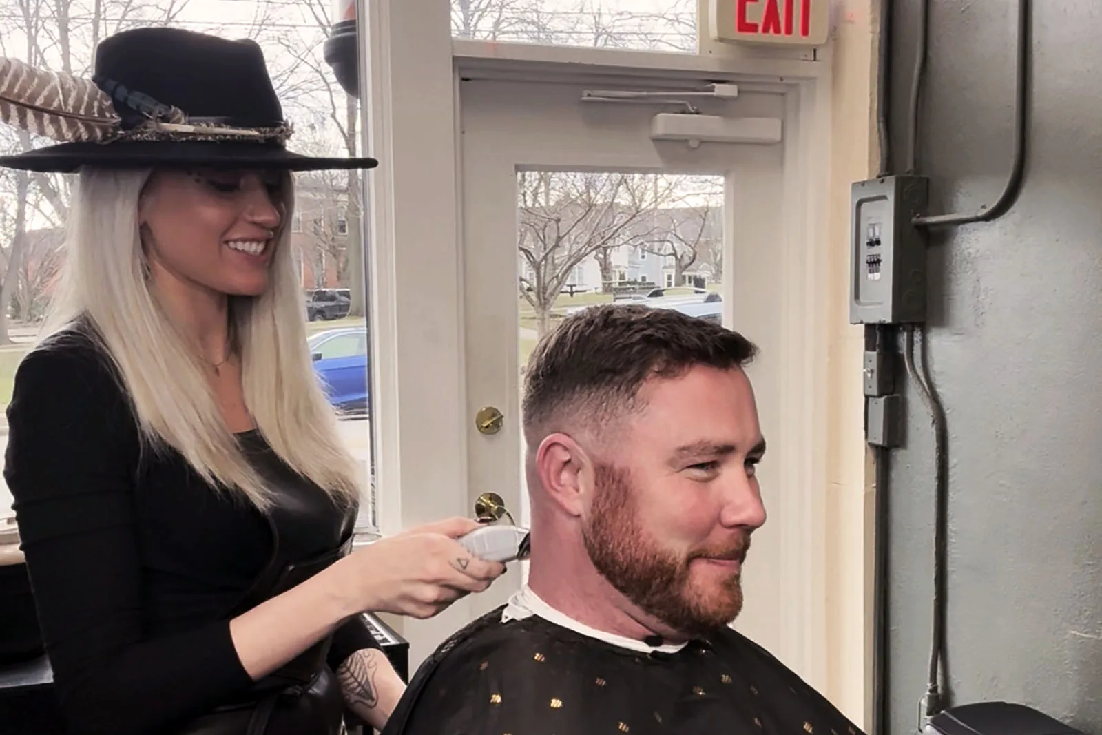 Building the bottom of a fade with clippers at Black Hat Barber in downtown Willoughby